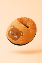Orange plush Melo USB heated foot warmer styled like a cozy paw cushion.