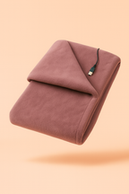 Melo USB heated flannel blanket used as a portable electric warming throw.
