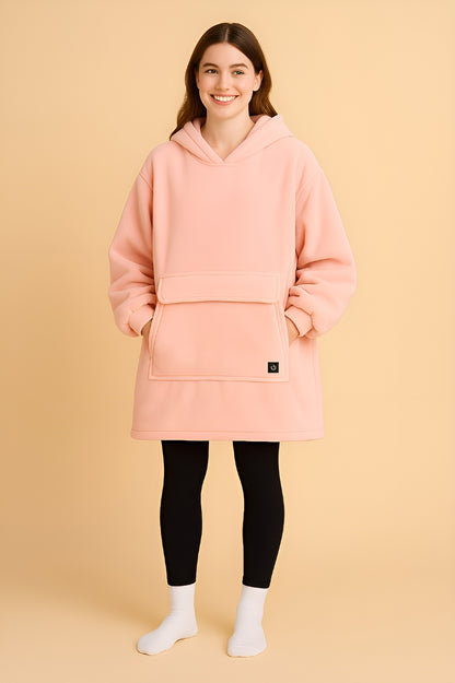 melo pastel pink usb heated hoodie blanket worn indoors for warmth and comfort