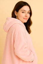 pastel pink plush heated hoodie blanket with sherpa lining studio shot