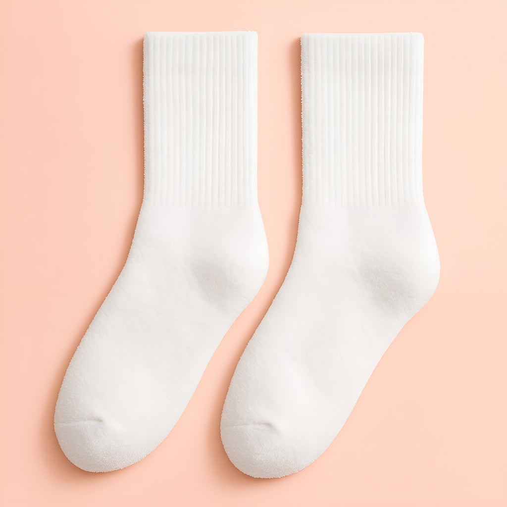 White Melo plush winter socks with soft cushioned interior for all-day comfort.