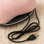 plush Melo USB heated foot warmer styled like a cozy paw cushion.