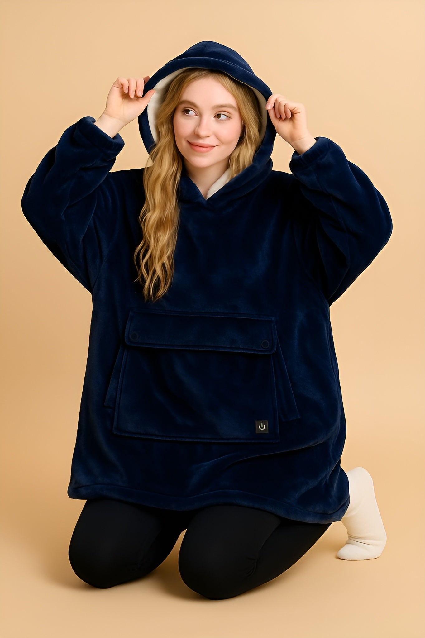 navy blue plush heated hoodie blanket worn indoors for winter warmth