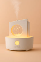 Melo water drop aromatherapy humidifier with soft glowing LED night light.